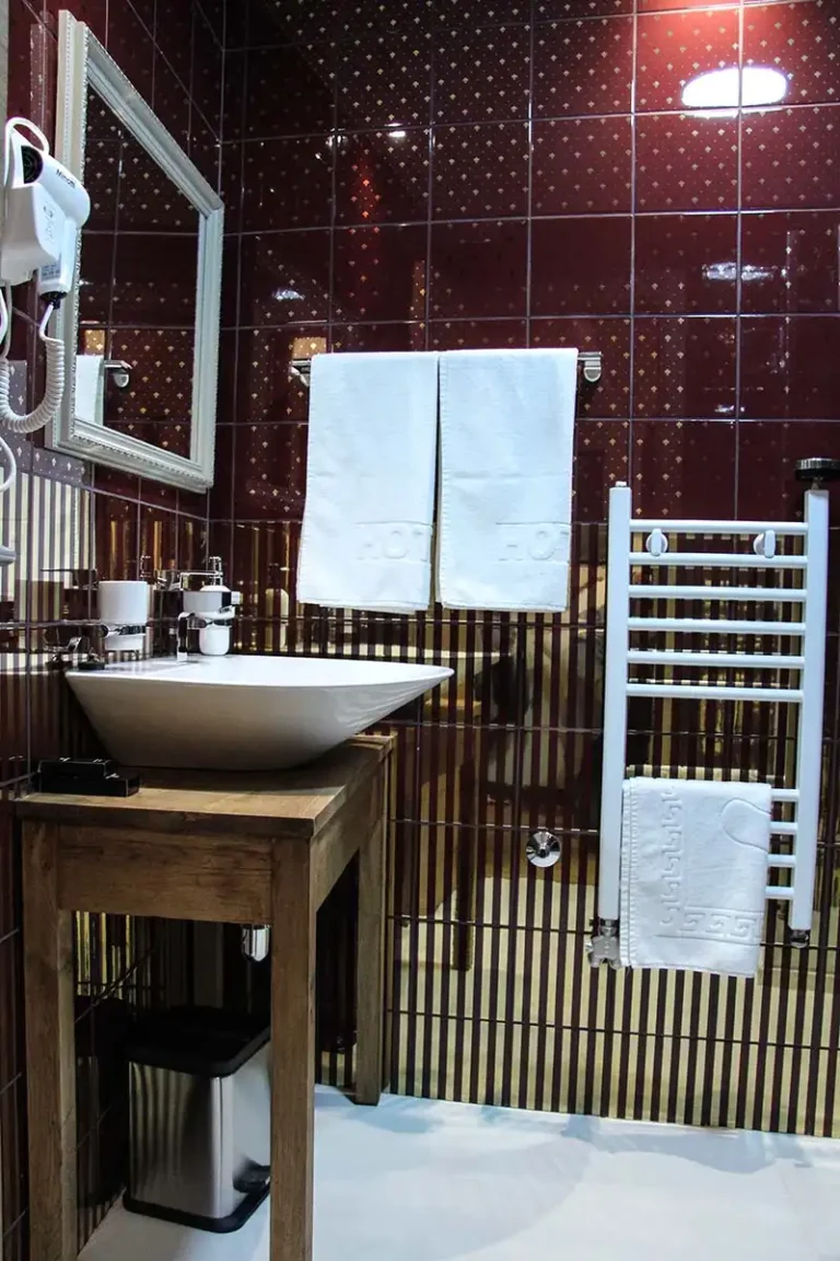 Private bathroom in the Deluxe Room at Villa Panuka